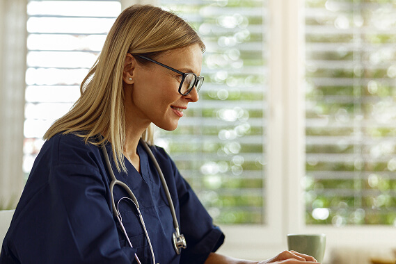 female-healthcare-worker-doing-some-paperwork-and-2023-11-27-04-49-45-utc 1 (1)