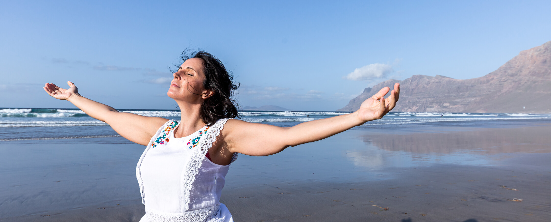 woman-breathing-fresh-air-near-sea-2025-03-06-02-09-20-utc (1)